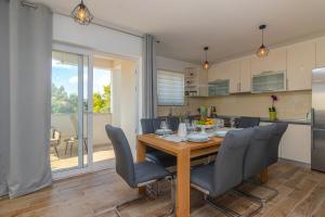 Kuchyň nebo kuchyňský kout v ubytování Holiday home MB