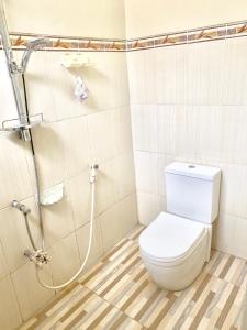 Ванна кімната в Sola Gracia Guest House & Kost