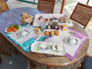 a table with a tray of food on it at B&B La Casetta Dei Nonni in Orvieto