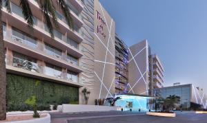 a rendering of a building with trees in front of it at Hotel Torre del Mar - Ibiza in Playa d'en Bossa