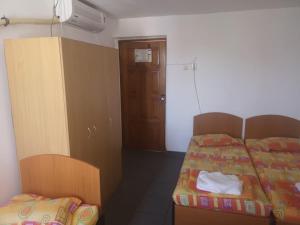 Postel nebo postele na pokoji v ubytování Felix Residence Costinesti