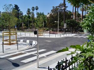 a empty street with chairs in a park at Hotel Victor Hugo Nice in Nice