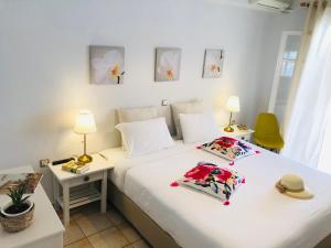 Postel nebo postele na pokoji v ubytování NIKOLETA'S CORFU APARTMENTS