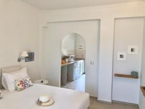 Postel nebo postele na pokoji v ubytování NIKOLETA'S CORFU APARTMENTS