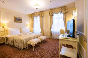 מיטה או מיטות בחדר ב-Europe Hotel