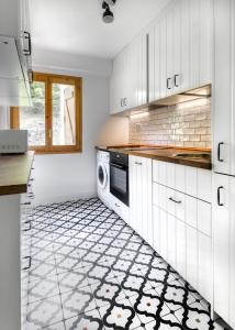 Kuchyň nebo kuchyňský kout v ubytování Duplex para 12 Panticosa