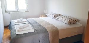 Postel nebo postele na pokoji v ubytování Sea View Apartment Elena