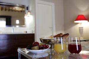 Residenza Palazzo Fortuna - Boutique Hotel italokat is kínál