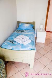Llit o llits en una habitació de casa vacanze da Nico