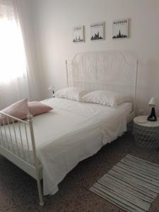 Кровать или кровати в номере Domus Marina