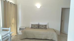 Postel nebo postele na pokoji v ubytování Joy Apartments Zakynthos