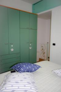 Tempat tidur dalam kamar di I Ragazzi del Borghetto