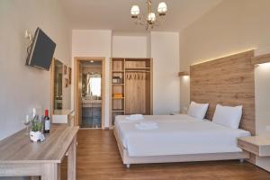 Posteľ alebo postele v izbe v ubytovaní Emmanouela's Apts