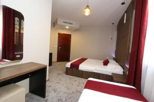 Postel nebo postele na pokoji v ubytování Prior Hotel
