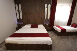 Postel nebo postele na pokoji v ubytování Prior Hotel