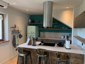 A kitchen or kitchenette at Borgo Al Tempo Perduto