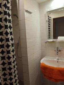 Koupelna v ubytování Hotel Isora