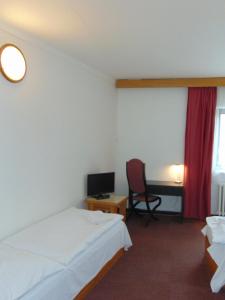 Postel nebo postele na pokoji v ubytování Hotel Isora