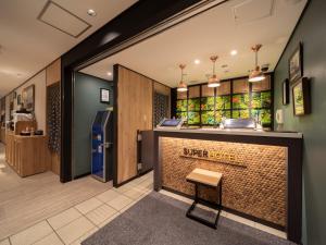 Kuchyň nebo kuchyňský kout v ubytování Super Hotel Tottori Ekimae
