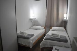 Posteľ alebo postele v izbe v ubytovaní Guesthouse Bakarac