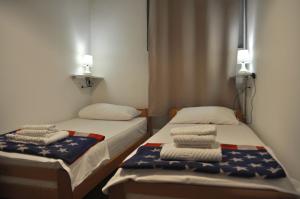 Posteľ alebo postele v izbe v ubytovaní Guesthouse Bakarac