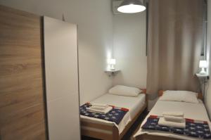 Posteľ alebo postele v izbe v ubytovaní Guesthouse Bakarac