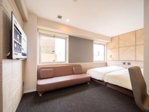 TV a/nebo společenská místnost v ubytování Super Hotel Tottori Ekimae