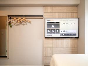 TV a/nebo společenská místnost v ubytování Super Hotel Tottori Ekimae