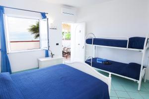 Postel nebo postele na pokoji v ubytování O' Vagnitiello - Parco Balneare Idroterapico - Camere - Ristorante