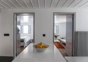 A bed or beds in a room at One Manto Square
