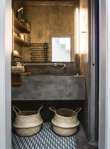 A bathroom at One Manto Square