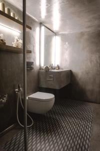 A bathroom at One Manto Square