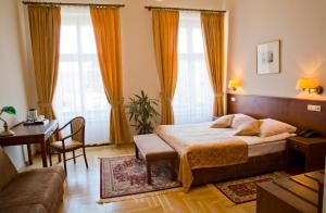 Posteľ alebo postele v izbe v ubytovaní Hotel Polonia