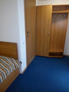 Postel nebo postele na pokoji v ubytování Hutor Hotel