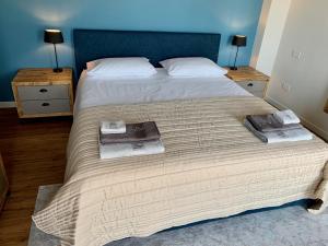 A bed or beds in a room at Borgo Al Tempo Perduto