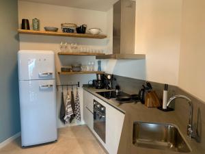 A kitchen or kitchenette at Borgo Al Tempo Perduto
