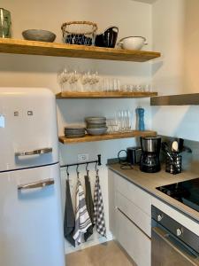 A kitchen or kitchenette at Borgo Al Tempo Perduto