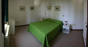 A bed or beds in a room at Casaleaurelia