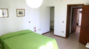 A bed or beds in a room at Casaleaurelia