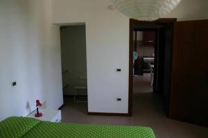 A bed or beds in a room at Casaleaurelia
