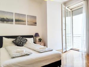 Posteľ alebo postele v izbe v ubytovaní Gold Rose Apartment with 3 rooms
