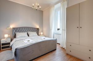 Łóżko lub łóżka w pokoju w obiekcie APARTMENTS NOVAK