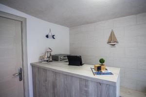 Kuchyň nebo kuchyňský kout v ubytování Hotel Sara