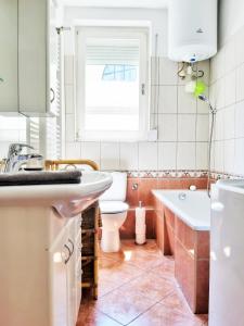Kúpeľňa v ubytovaní Gold Rose Apartment with 3 rooms