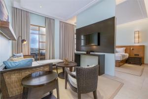 Voodi või voodid majutusasutuse Savoy Seychelles Resort & Spa toas