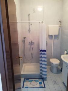 Koupelna v ubytování Apartments Alexa