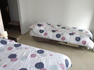 Postel nebo postele na pokoji v ubytování Apartments Alexa