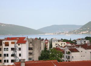 a view of a city and a body of water at Apartments Mira in Tivat
