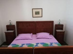 Postel nebo postele na pokoji v ubytování Apartments Alexa