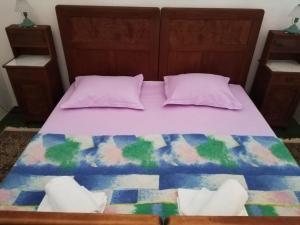 Postel nebo postele na pokoji v ubytování Apartments Alexa